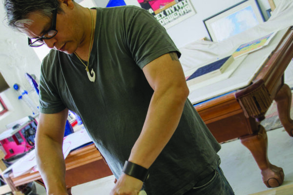 Mateo Romero working in his studio.