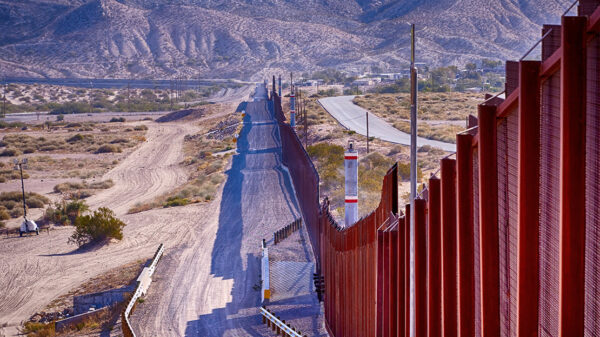 El Paso, Texas border wall between USA and Mexico running thru the desert.