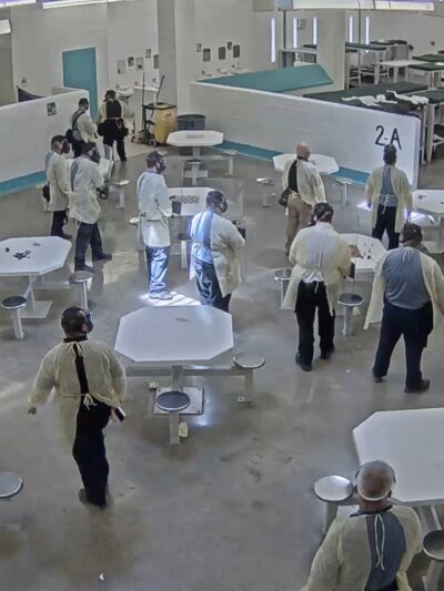 A screenshot of surveillance video taken shortly before men detained at the Torrance County were pepper sprayed for engaging in a peaceful hunger strike protesting conditions at the facility. Surveillance and lapel video was obtained by NMILC and ACLU fro