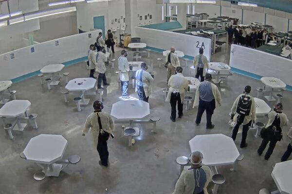 A screenshot of surveillance video taken shortly before men detained at the Torrance County were pepper sprayed for engaging in a peaceful hunger strike protesting conditions at the facility. Surveillance and lapel video was obtained by NMILC and ACLU fro