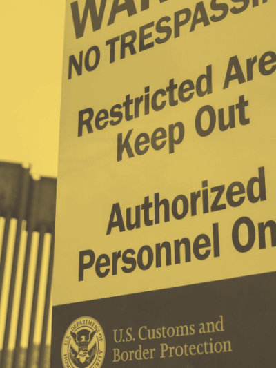 Warning no trespassing. Restricted area keep out. Authorized personnel only. U.S. Customs and Border protection sign.