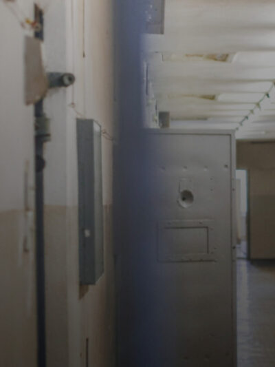 Graphic showing a prison hallway.