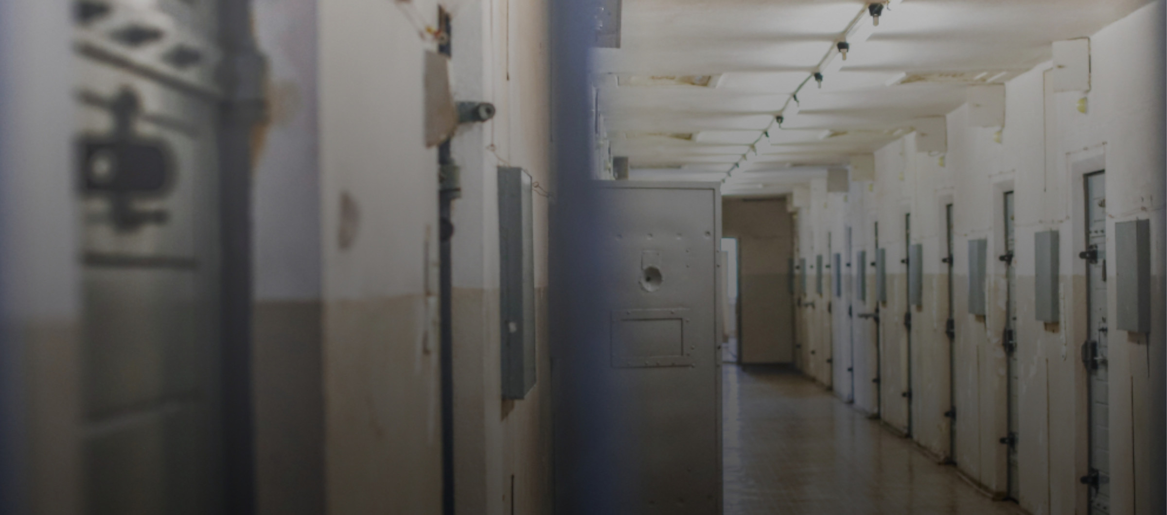 Graphic showing a prison hallway.