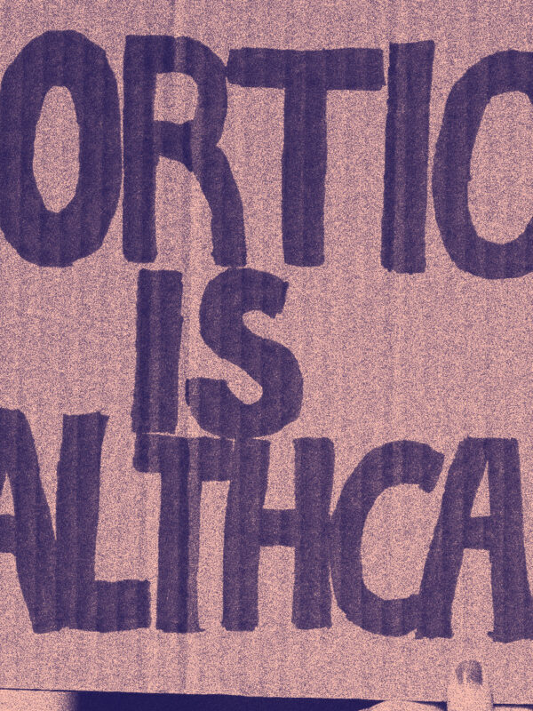 Stylized image of someone holding up a sign that reads "Abortion is healthcare"