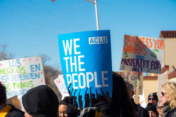 ACLU We the People banner at a protest.