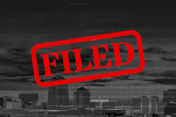 Stylized black and white image of the city of Albuquerque with the word "FILED" in front of it in red letters