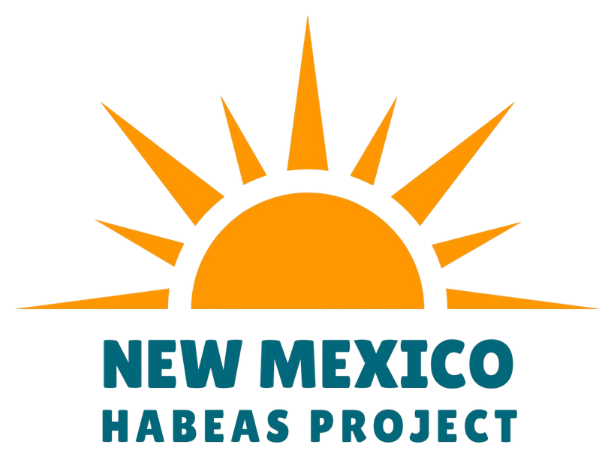 A logo featuring a rising sun and the text New Mexico Habeas Project