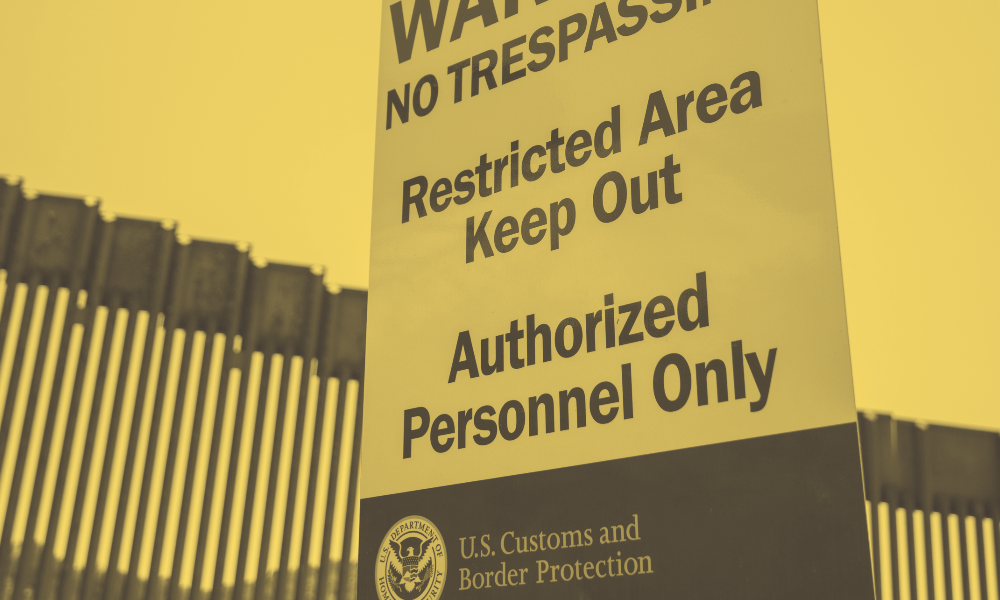 Warning no trespassing. Restricted area keep out. Authorized personnel only. U.S. Customs and Border protection sign.