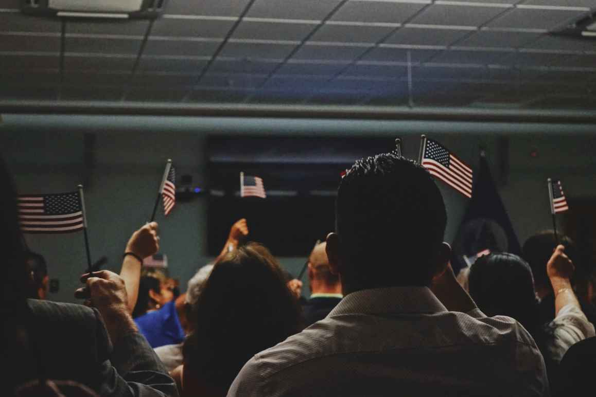 Title 42 Op-Ed, Immigrants Waving American Flags