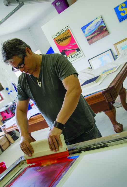 Mateo Romero working in his studio.