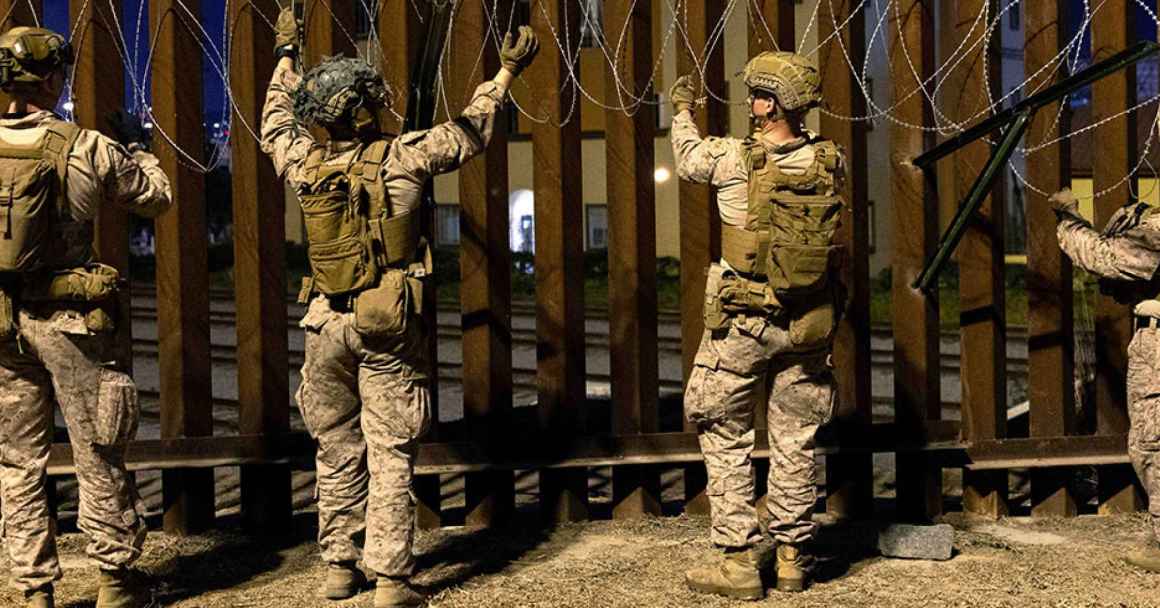 Image of national guard on the border wall