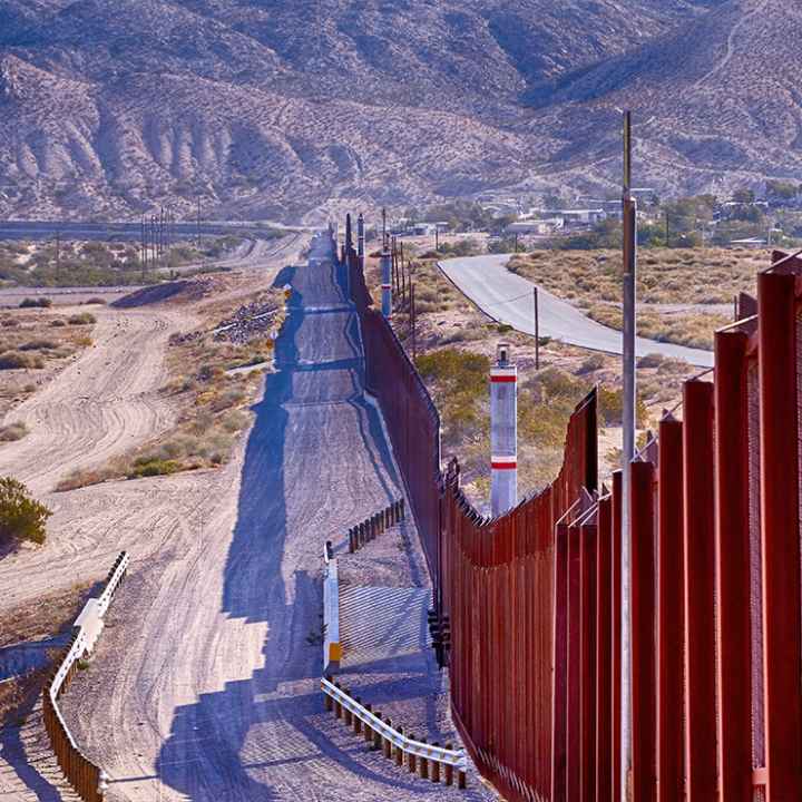 El Paso, Texas border wall between USA and Mexico running thru the desert.
