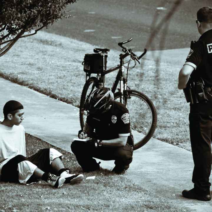 Man being arrested by police Man being arrested by police