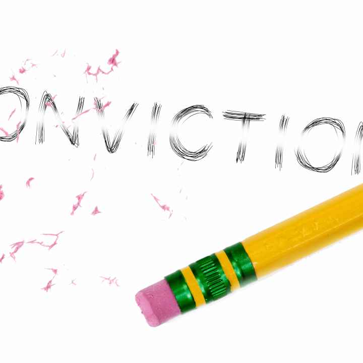 The word conviction being erased 