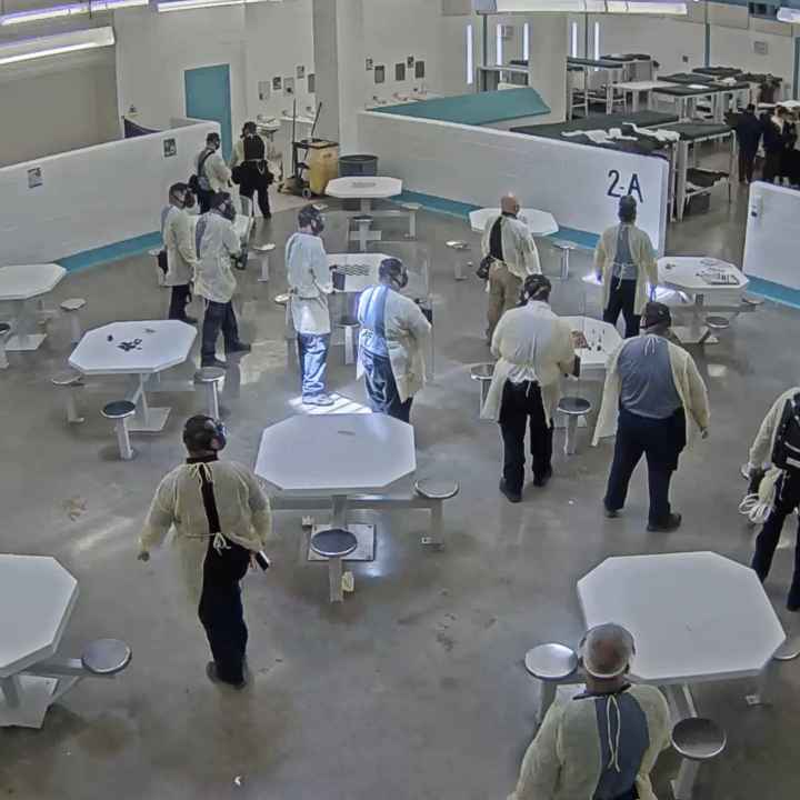 A screenshot of surveillance video taken shortly before men detained at the Torrance County were pepper sprayed for engaging in a peaceful hunger strike protesting conditions at the facility. Surveillance and lapel video was obtained by NMILC and ACLU fro